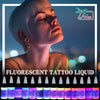 14-color fluorescent tattoo ink set with 15ml bottles displayed under UV light | GTARTISTOO