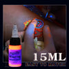 15ml bright red UV light tattoo ink shown during fluorescent tattoo application | GTARTISTOO