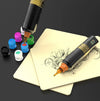 Wireless tattoo pen machine used with tattoo ink cups and practice skin for stencil practice, lining, shading, and color work.