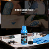 Blue tattoo ink 1 oz bottle shown with blue ink tattoo designs and tattoo equipment | GTARTISTOO