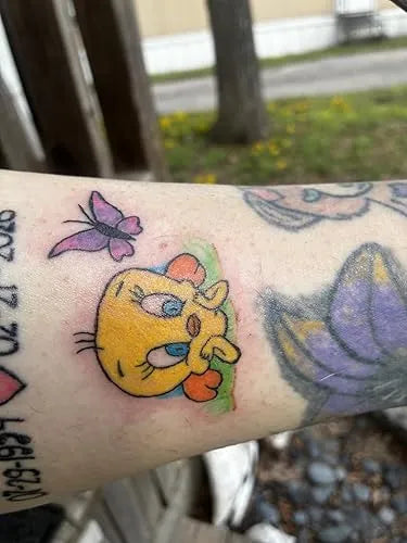 gtartistoo vivid duckling and butterfly tattoo ink artwork with bright colors