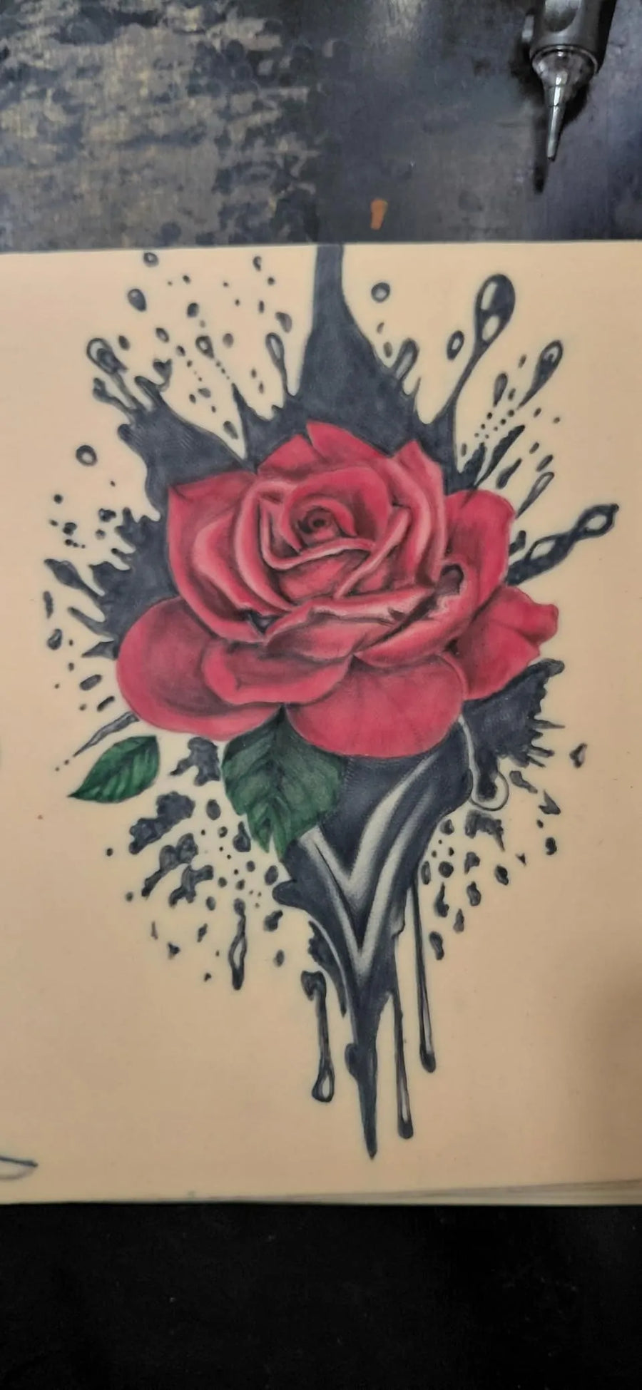 gtartistoo rose tattoo ink artwork on tattoo practice skin with black splash design