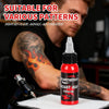 Red tattoo ink 1 oz bottle displayed with tattoo machine in a tattoo studio | GTARTISTOO